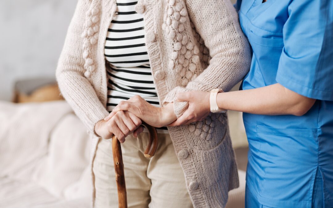 senior with caretaker preparing home for safety and fall prevention to age in place